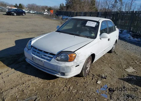 2005 Hyundai Accent Gls z USA, uszkodzony, nr VIN KMHCG45C15U612612